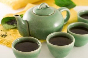 green tea pot and cups